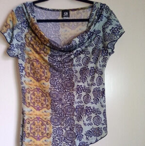 Dynamite boho top with drape neckline  flutter sleeves and slant hem with tie